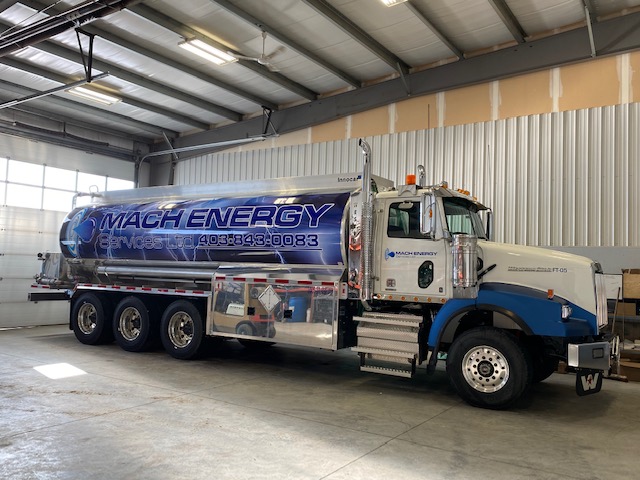 A Picture of fuel truck painter in blue and white